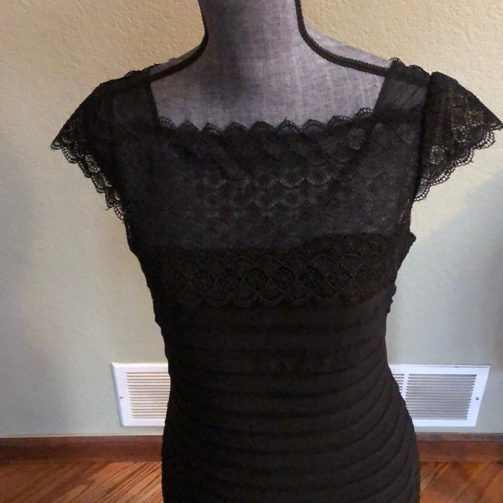 Black cocktail dress with lace top